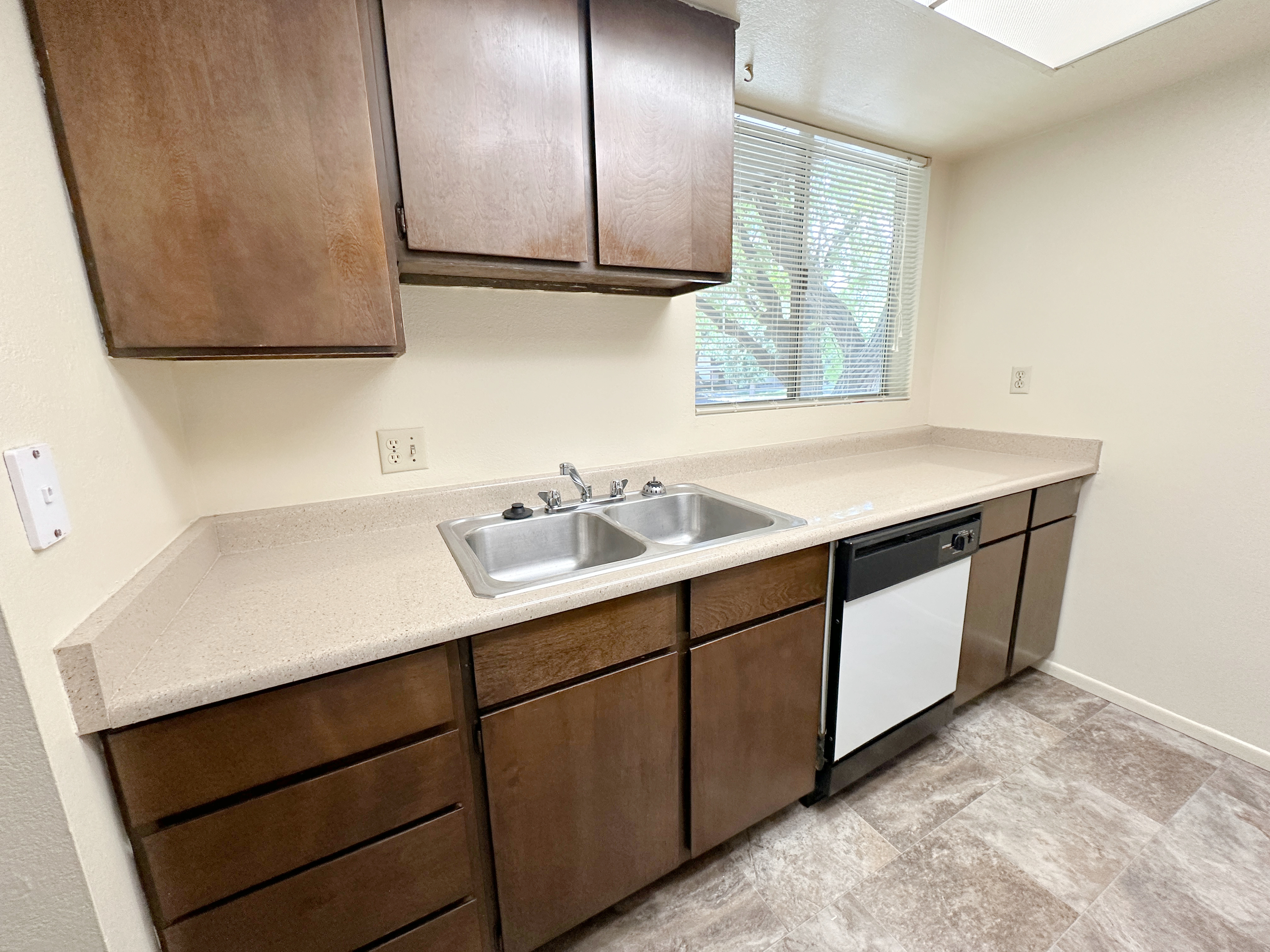 Kitchen with dishwasher and ample counter space
